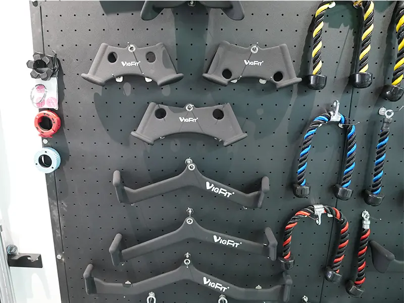 VIGFIT cable machine pull handles and triceps ropes displayed on a gym accessory wall.