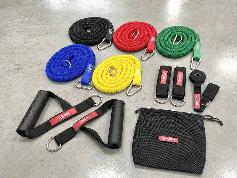 VIGFIT colour-coded resistance tube set with handles, ankle straps, a door anchor and a mesh carry bag