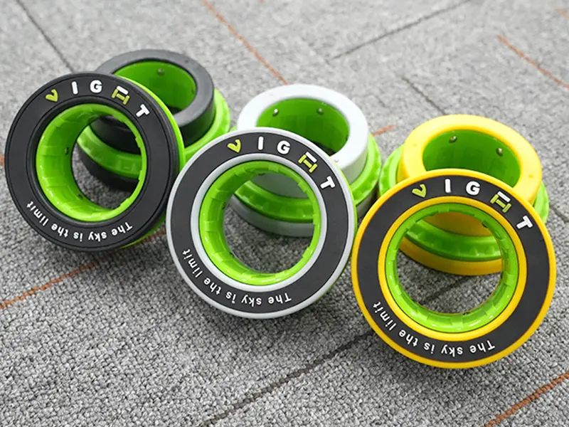 VIGFIT quick-release barbell collars in black, white and yellow color options.